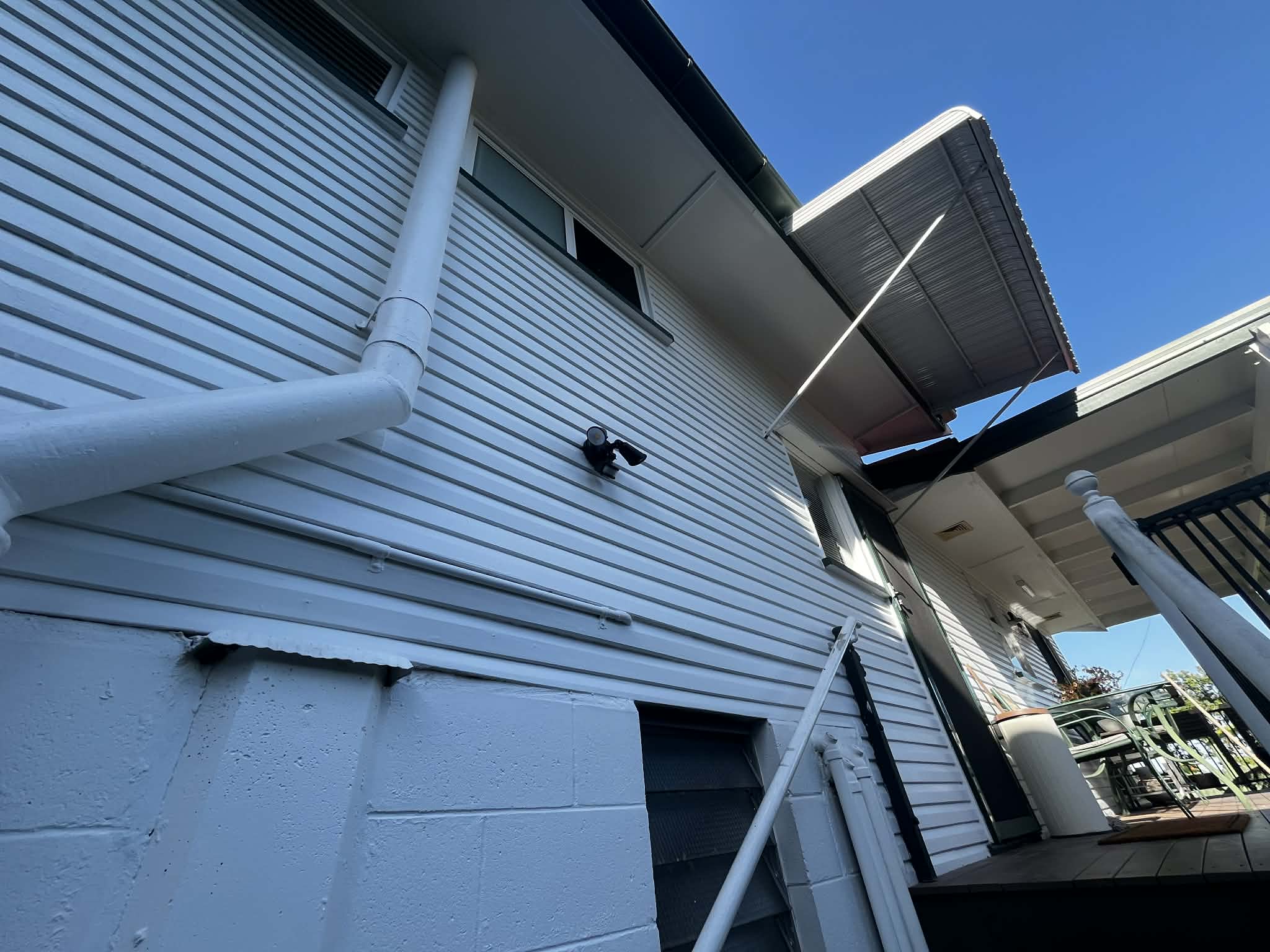 Exterior weatherboard house repaint