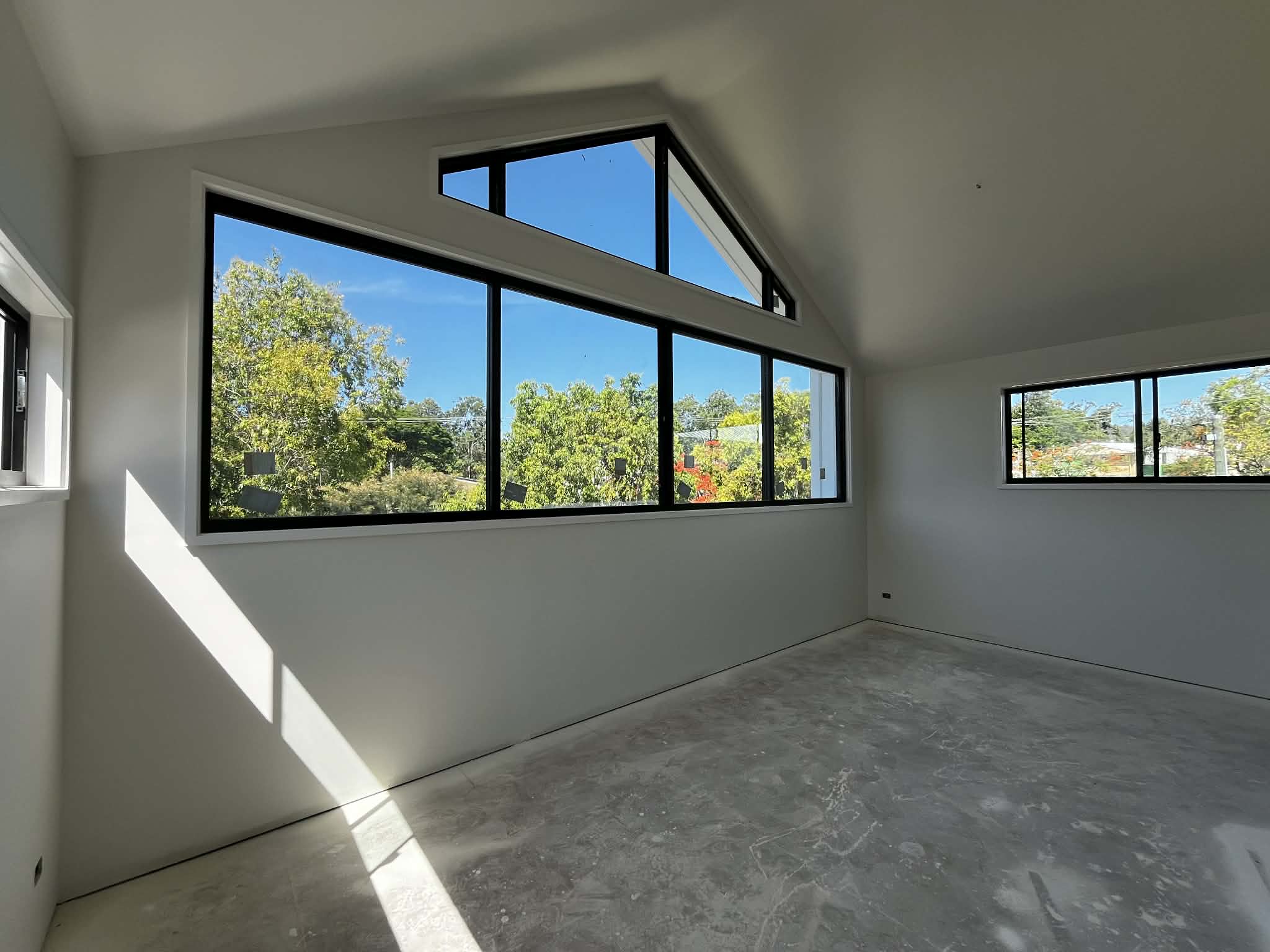 Painted interior with large feature window
