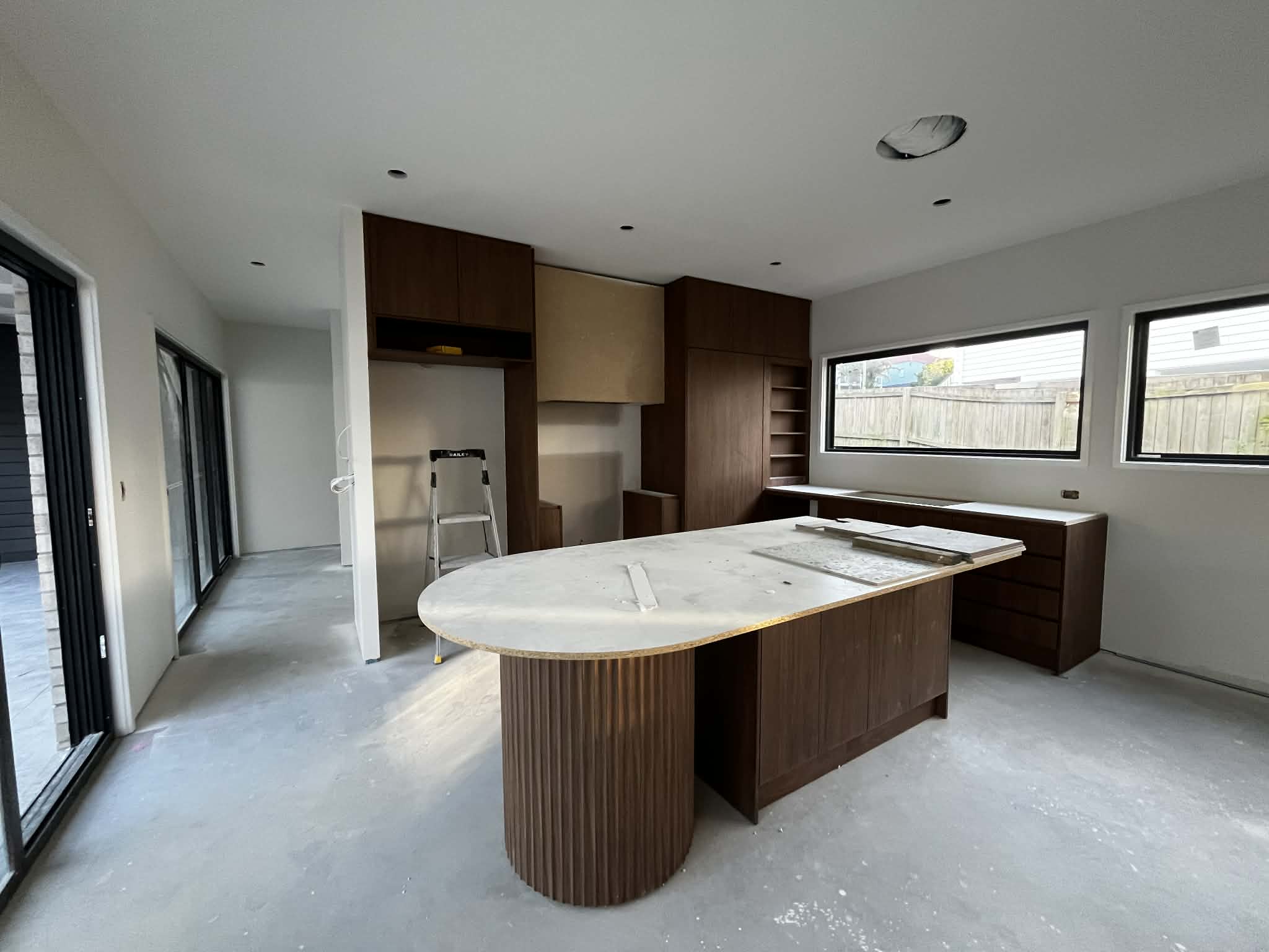 Painted new-build kitchen and living interior